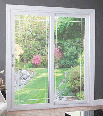 Contemporary vinyl sliding patio door for maximum glass area